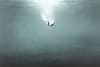 Woman falling through water.