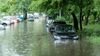 Cars in a flood.